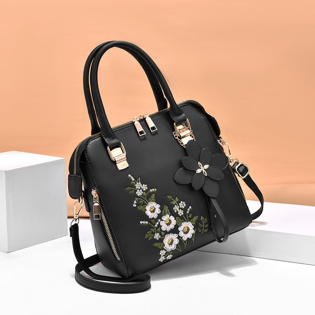Model kwiatowy czarnej torby Elise
